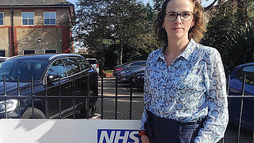 Alison Bennett outside local NHS facility