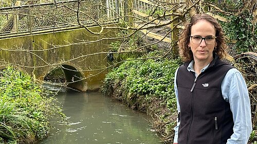 Alison Bennett observing a Sussex stream.