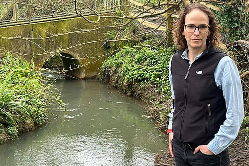 Alison Bennett observing a Sussex stream.